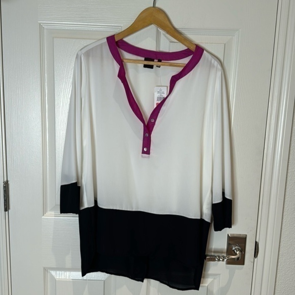 Saks Black label tunic. So cute and flattering NWT.